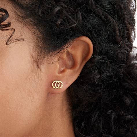 gucci 18k yellow gold running g stud earrings|Gucci interlocking gg earrings.